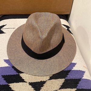 sun hat, black ribbon band, slightly dented